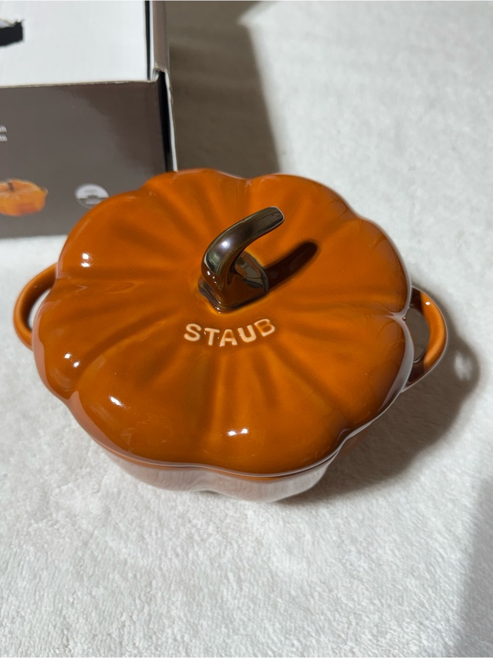 Staub Pumpkin Cocotte in Deep Orange with Bronze Stem